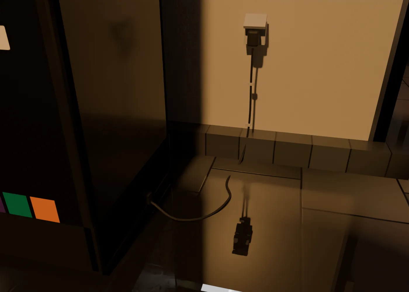 The cooler's cable from behind: strain relief, slack on the paving, two clips up the kiosk wall, a plug in an outdoor socket.